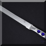 K20. Beaded serrated knife. - $10 